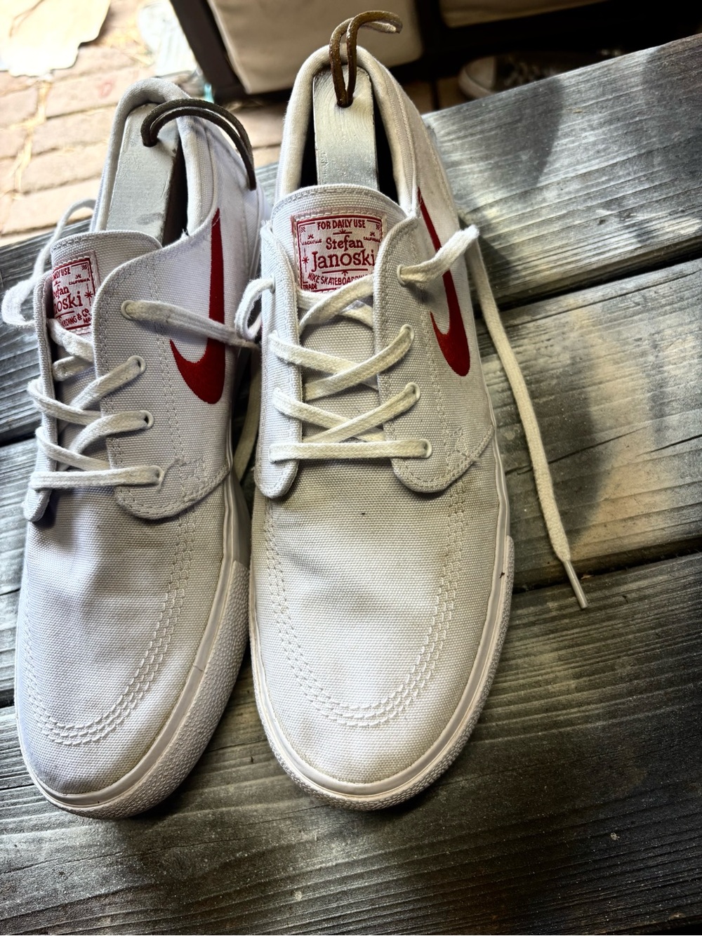 Nike Stefan Janoski white sneakers with red swoosh size11 good condition